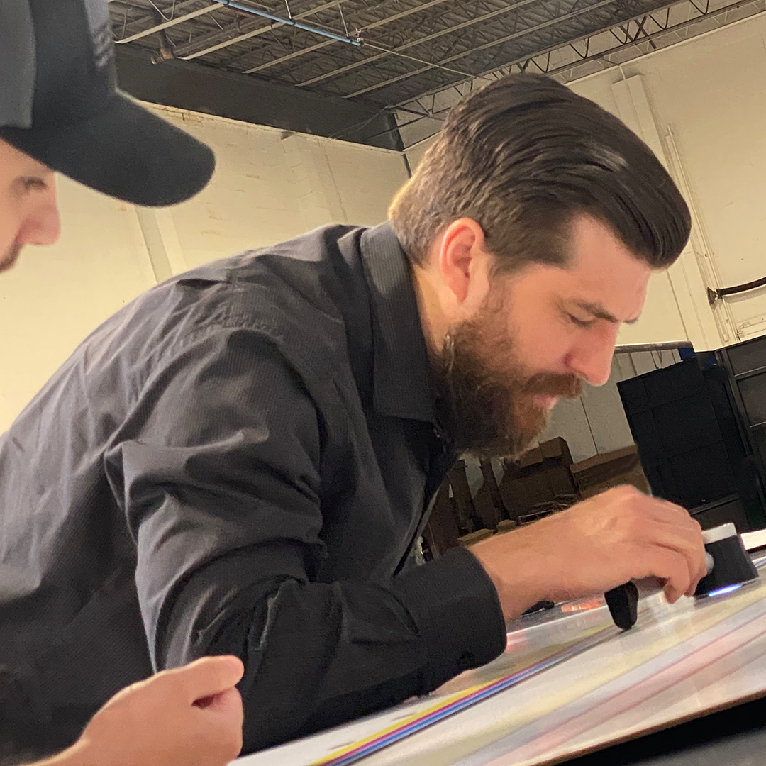 Chris reviews print quality at our Solutions Center